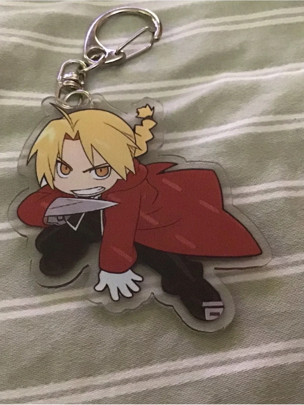 Anime Acrylic Keychain with Blond Character in Red Coat